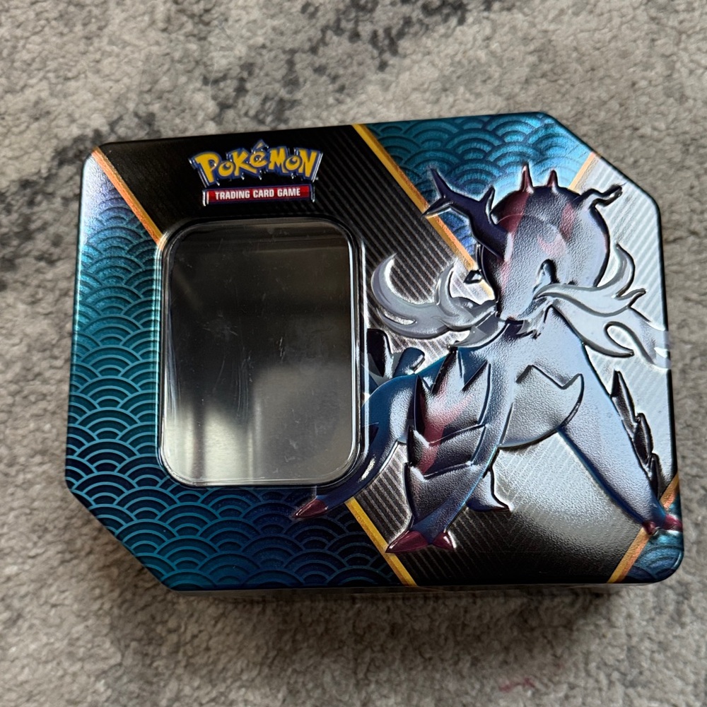 Pokemon Tin with Blue and Black Design